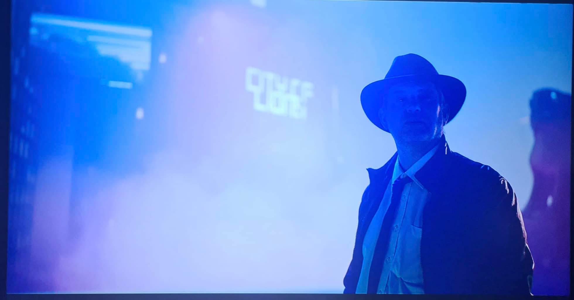 Phil Gwilliam as Detective Fitz in Rooftop Meeting